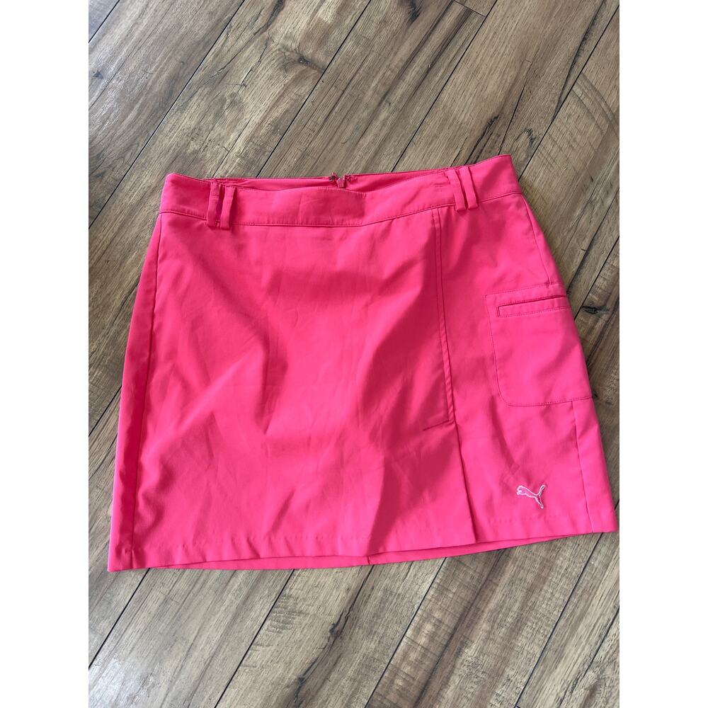 Puma size 8 coral colored golf skort